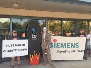 Climate activists target Siemens in Mackay Adani protest