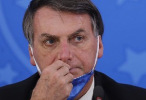 Brazil’s president attacks media instead of combatting COVID-19