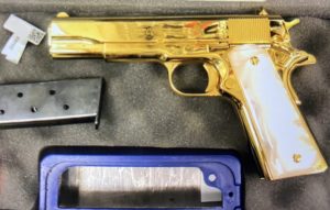 US woman arrested with Gold-plated handgun at Sydney Airport